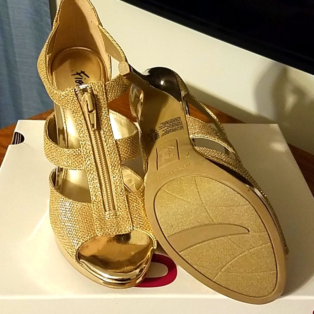Gold high healed zip up shoes
